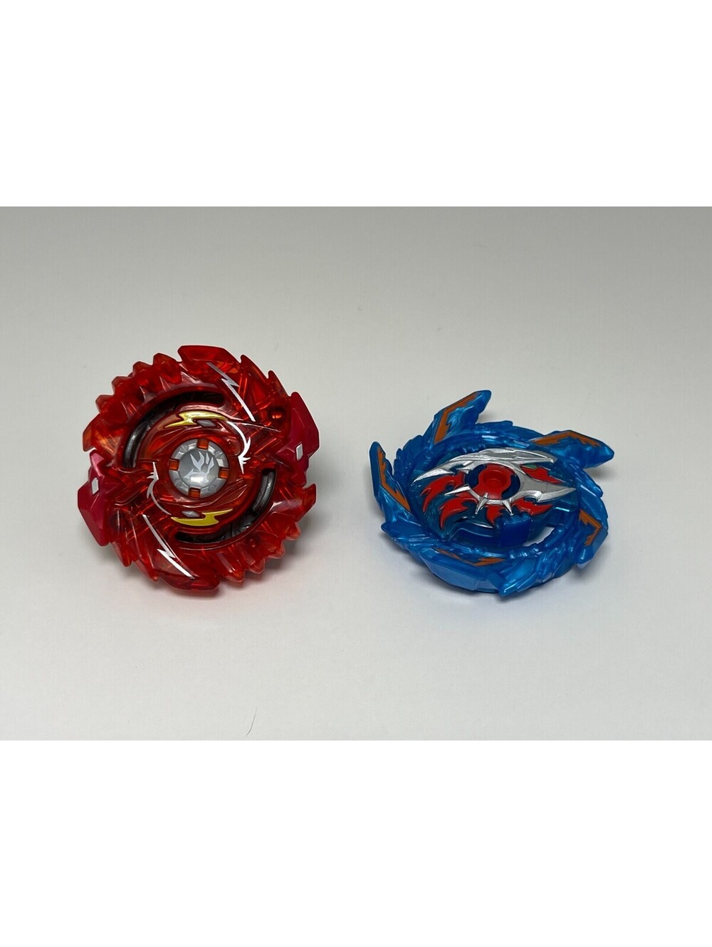 Beyblade Burst Turbo SwitchStrike Regulus and Surge Speed Storm Kolossal Helios